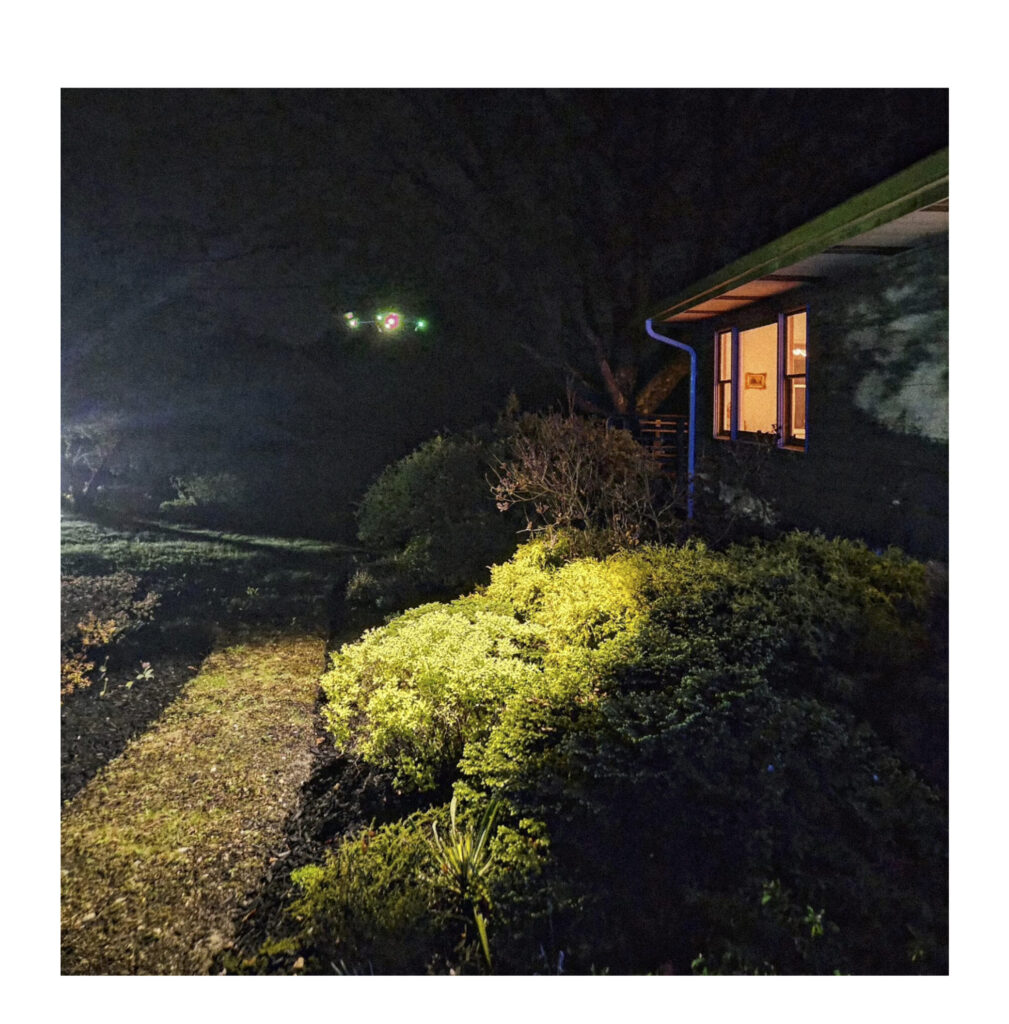 Title: Last night, a car drove by as the drone hovered outside the house, looking in. Size 14 x 11 inches Year 2025 Materials Digital color print